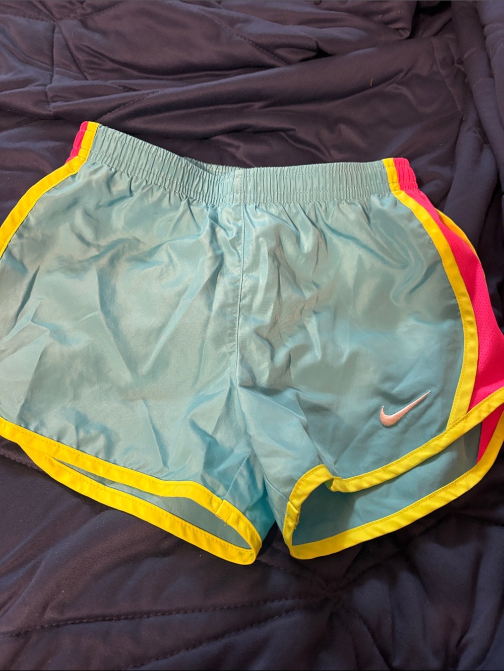 Nike Women's Teal Athletic Shorts with Yellow Trim and Pink Panels